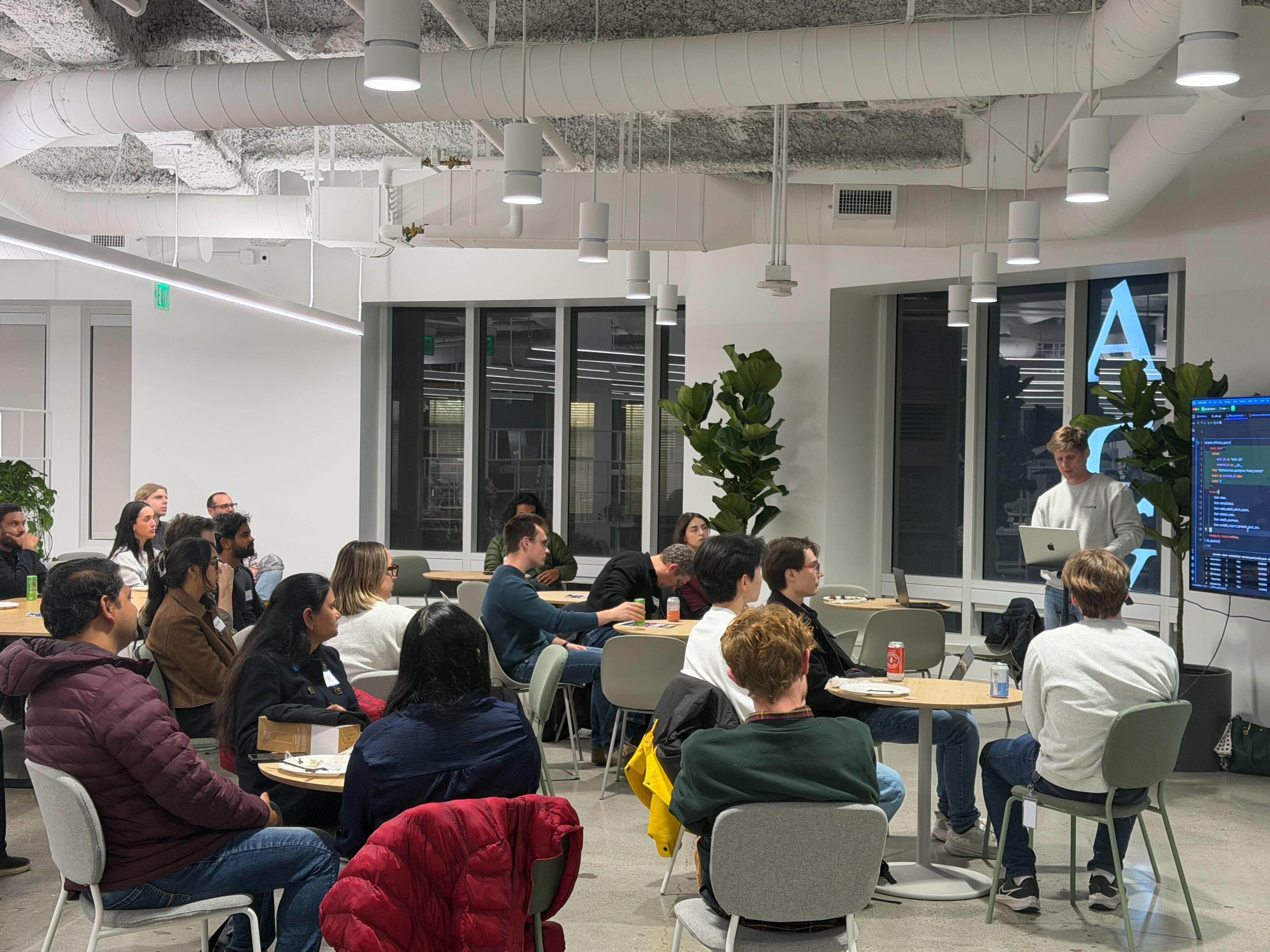 Elliot demoing to a room of engineers